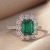 7.11 CT Emerald-cut Green Emerald Halo Ring