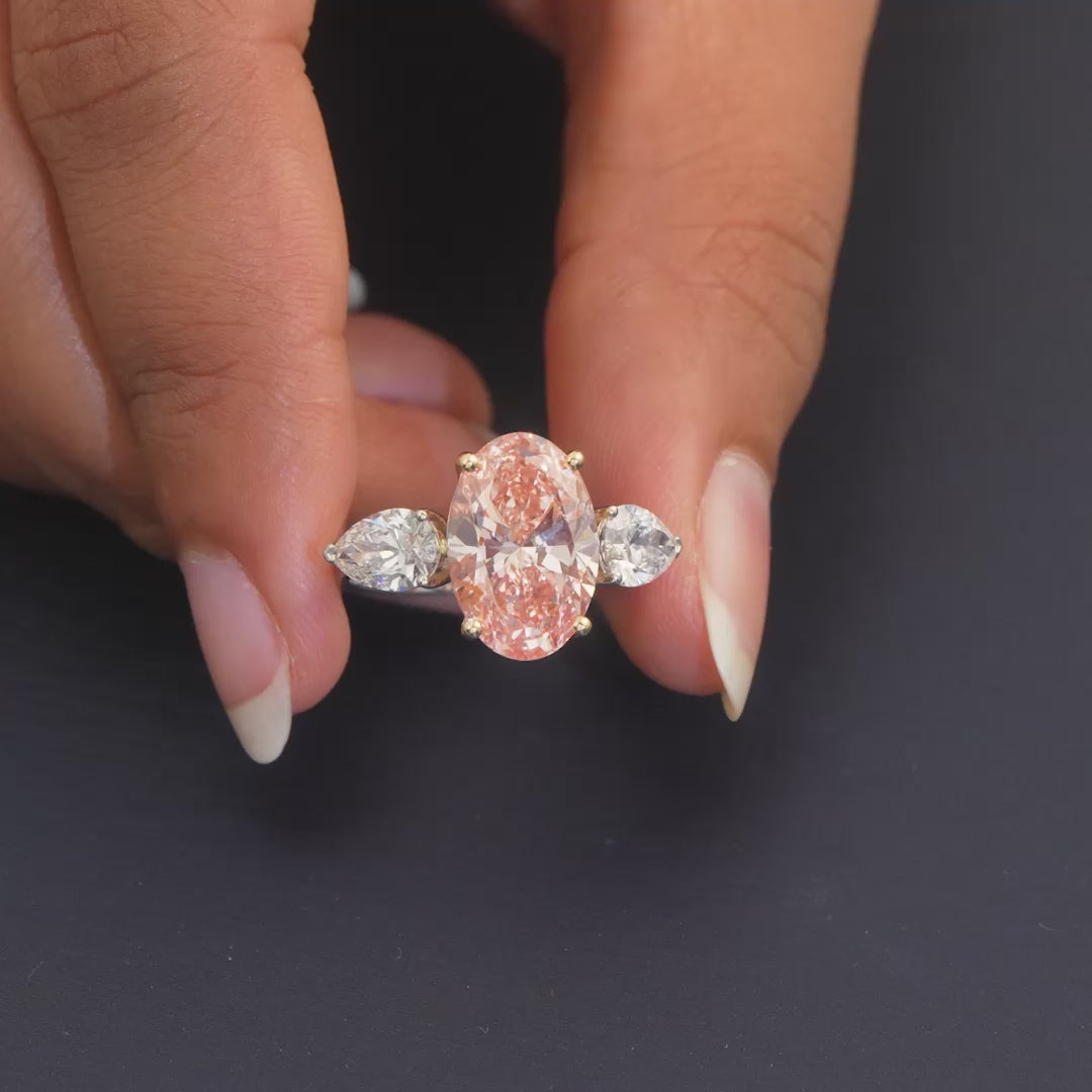 6.51 CT Oval Cut Three Stone Ring with Pink Diamond
