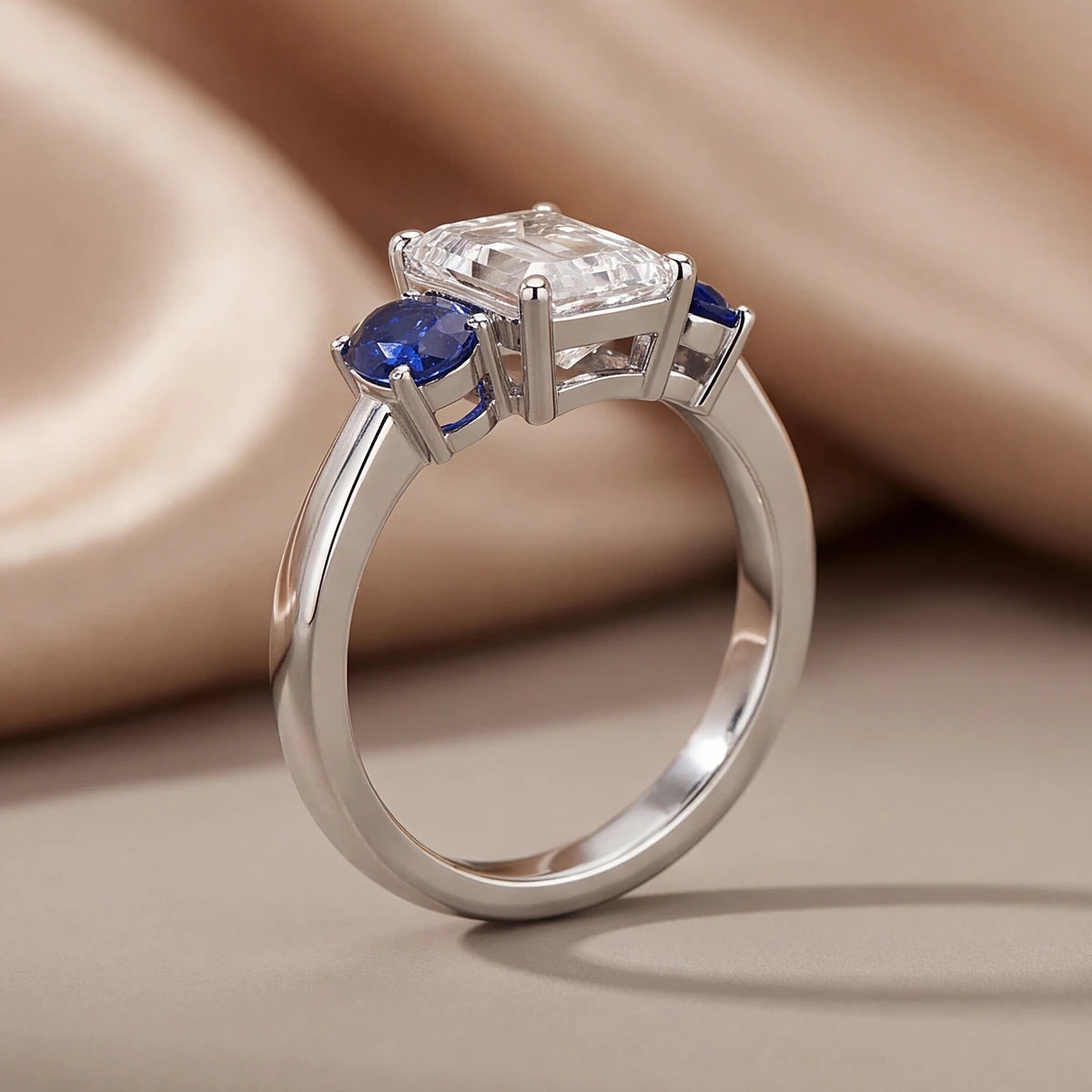 2.10 CT Emerald-cut & Oval Sapphire Three Stone Ring