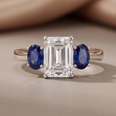 2.10 CT Emerald-cut & Oval Sapphire Three Stone Ring